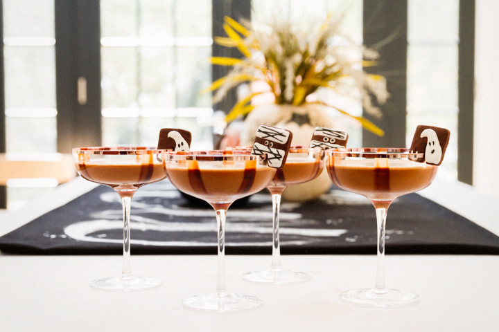 halloween drink for adults with cute spooky cookies