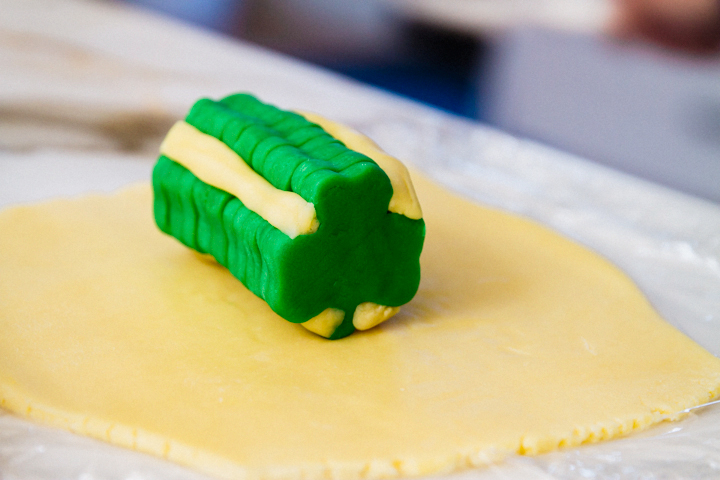 Stack the shamrock shaped dough and place on another rolled out piece of sugar cookie dough