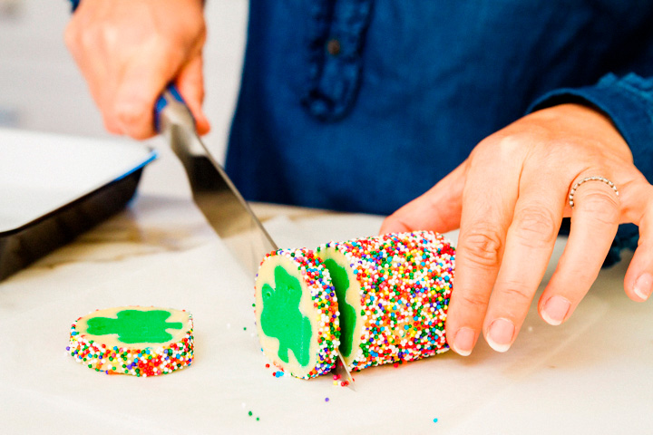 Carefully slice each shamrock cookie onto parchment for baking