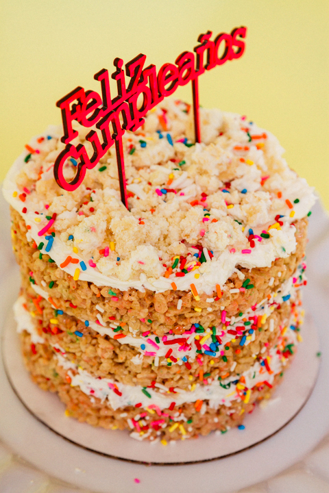 Funfetti Rice Krispie Naked Cake with Feliz Cumpleanos sign